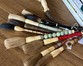 large collection of calligraphy brushes