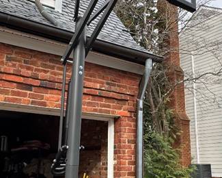Adjustable basketball hoop