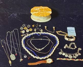 Assortment of jewelry seashell box