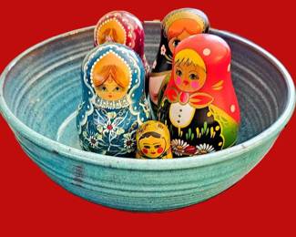 Russian nesting dolls in vintage bowl