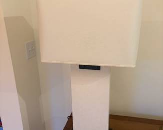 $900.  A pair of Restoration Hardware rectangular column  limestone with bronze trim table lamps originally $1522 for the pair.    Each is 30 inches high. No longer made in limestone.  