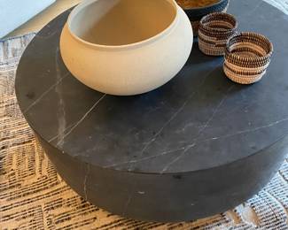 $1200.  Restoration Hardware marble Plinth round coffee table on wheels.  Originally $2977.  36 inch diameter by 14 inches high.  No longer available in  grey in this size.    Accessories only available during in person shopping Friday and Saturday.
