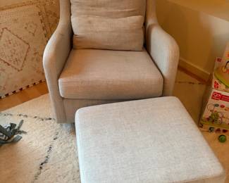 $400. Monte Design Group Swivel Rocking chair and Ottoman.  29"w x 36"d x 38"h.  Ottoman is 23" x 20".  Retails for $1899.  As found  in next photo