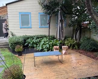 $100. Outdoor glass on metal base coffee table