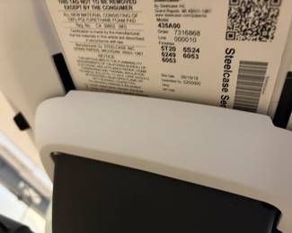 underside showing chair label