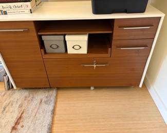 $650. BDI  Multifunction cabinet in natural walnut with white trim.   48"w x 18"d x 29.5"h.  Originally $1899.  