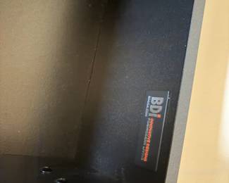 inside the drawer of the cabinet