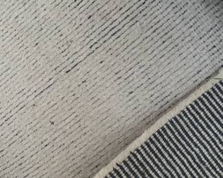 closer view of the rug with backside folded over.