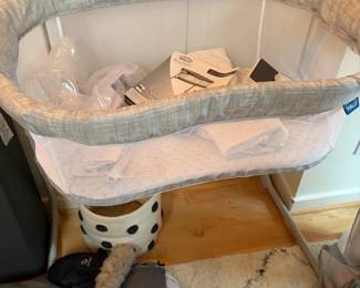 close up of bassinet for sale during in-person shopping Friday & Saturday