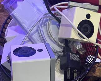 Surveillance camera set ups - many to choose from 3 shelves of various brands of camera set ups hard wire or WiFi 