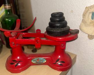 Vintage red cast iron "The Viking" balance scale by F.J. Thornton & Co. Ltd., likely made in the 1940s or 1950s in England