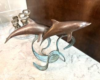 Small bronze/copper dolphin sculpture