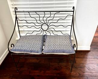 Sunburst design back wrought iron bench
