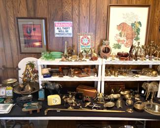 Huge collection of vintage brass candle sticks, candelabras and figurines.