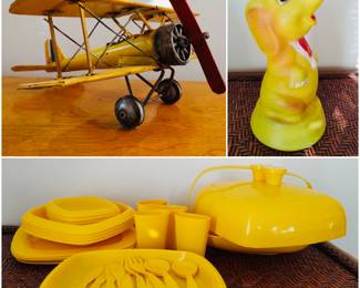 A vintage-style metal biplane model, a vintage rubber elephant squeak toy, and vintage yellow "Picnic Butler" four-person picnic set. 