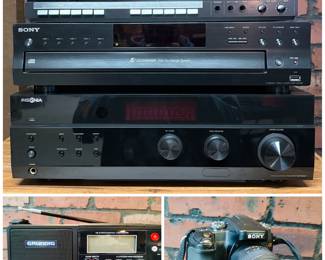 A Sharp stereo cassette deck, model RT-W800, featuring auto-reverse on both decks. 
A Sony 5-disc CD changer with a disc exchange system. An Insignia NS-R2001 AM/FM stereo receiver capable of 200 watts output. A Grundig S450DLX Field Radio and a Sony Alpha a100 Digital SLR camera with a DT 18-70mm f3.5-5.6 zoom lens.