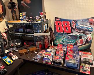 Die-cast NASCAR memorabilia, home decor, figurines including Dale Earnhardt Jr. merchandise. 