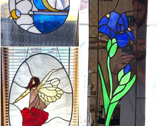 Collection of stained glass window hanging panels,