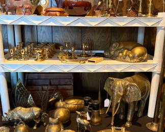 Collection of brass figurines and candelabra’s