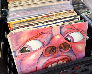 vintage vinyl record collection including: 
Jimi Hendrix Experience Smash Hits
Magical Mystery Tour by The Beatles
Mississippi Fred McDowell
In the Court of the Crimson King by King Crimson
Van Halen, Bob Dylan, and Alice Cooper