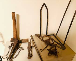 Antique iron animal traps.