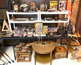Collection of Native American artifacts and decor, antique oil lamp and cowboy decor. 