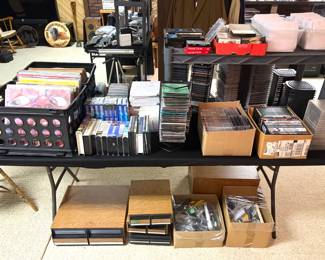 Vintage records, cds, cd organizers, VHS tapes and VHS storage. 