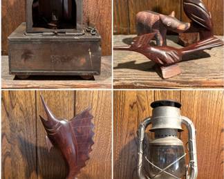 Antique Railway Signal Lamp, branded "BRM" by Sherwoods Birmingham. Vintage, hand-carved ironwood sculptures and a vintage Dietz No. 2 D-Lite kerosene lantern. 
