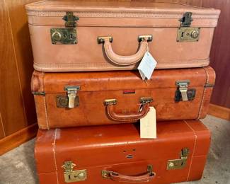 Three Vintage Suitcases Full of Linens