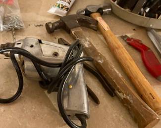 Craftsman 1/4" electric drill, along with two hammers
