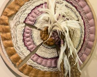 bohemian-style circular woven wall hanging 