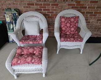 Wicker Basketweave All Weather Resin Wicker. Two chairs and an ottoman.