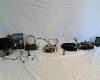 Binoculars Cameras Clocks