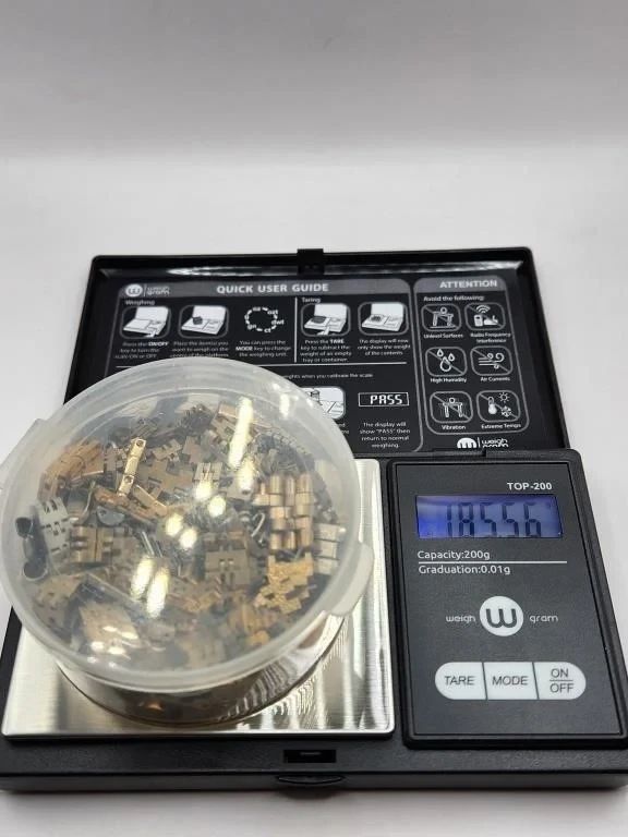 LARGE LOT OF GOLD WATCH PARTS AND PIECES.