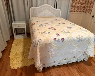 Full size wicker bedroom set: headboard and frame, side table, and mirror.