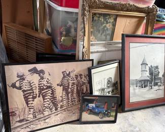 Framed prints and antique frames.