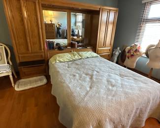 Queen size mattress, headboard and storage cabinets (all sold separately)