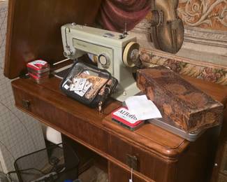 Sewing machine and desk