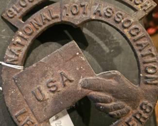 Cast metal emblem for the National Association of Letter Carriers, Gloucester Branch 107