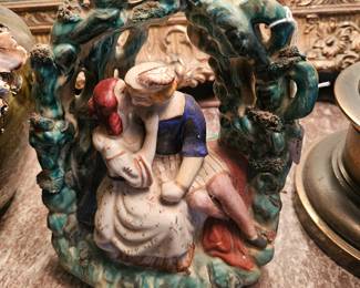 19th Century Staffordshire ceramic figurine of a romantic couple.
