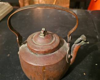 Vintage copper kettle with a decorative spout, likely from Taiwan.