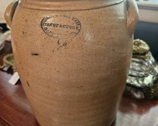 Antique Bangor Stoneware Company crock with lug handles and stamped mark.