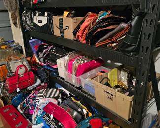 Lots of purses of all sizes including some designer purses