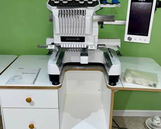 Brother embroidery machine 2
Table included