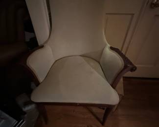 Winged armchair