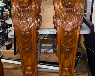 Pair of mantle pieces for a fireplace. They are hand, carved Ogeany and stand about 50 inches tall.