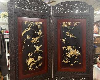 Beautiful Rosewood and mother of pearl Asian screen from the late 19th. It is 80 inches tall.