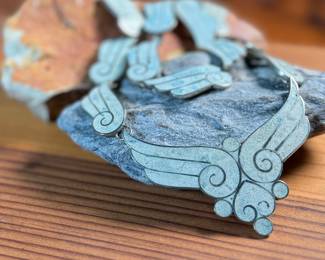 This lot features a gorgeous set of Taxco jewelry with sterling silver and inlaid blue stone with a marble-like appearance. The necklace measures, 17” and the bracelet, 7”. All items bear a maker’s mark as shown in photos with a total approx. weight of 58.00 grams.

