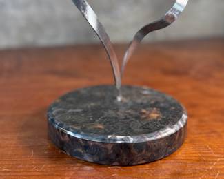 “Mother and Child”, a steel sculpture by listed artist, Fred Doolin. Signed underneath as shown in photos and measures, 13” H x 6” W x 6” D.

