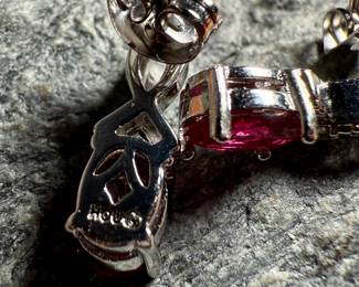 This lot features a pair of ruby and diamond ribbon stud earrings designed by, Sonia Hou. SONIA, a Los Angeles based Chinese American jewelry designer and fashion enthusiast, always had trouble finding stylish, reasonably priced jewelry that was safe on her skin and long-lasting in the sense that it will not easily flake. She would shop at major retailers and overspend on jewelry made out of cheap metals that would cause her allergic skin reactions.

